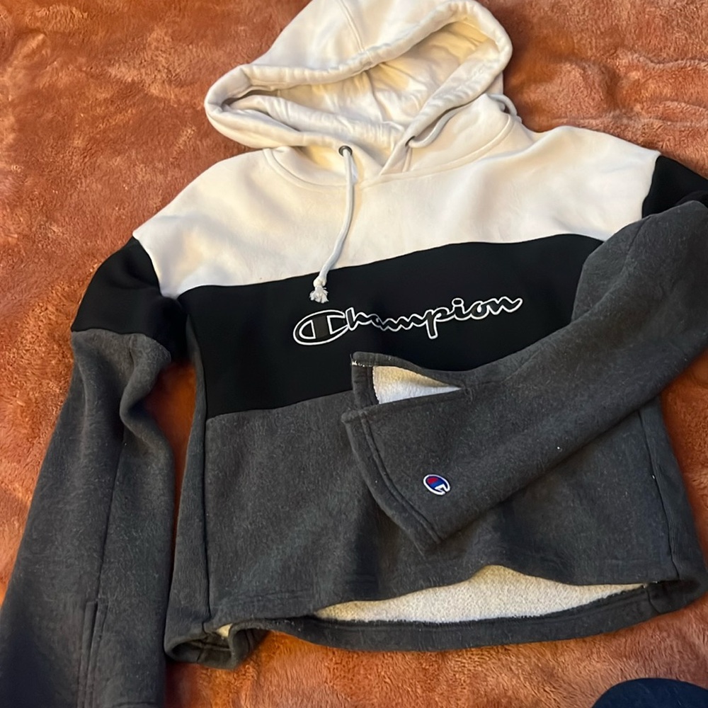 Grey, black , and cream color .